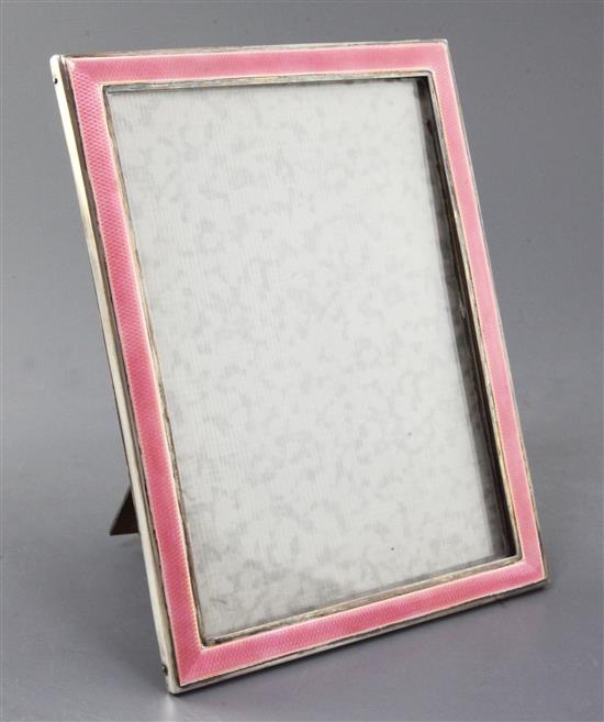 An early 1930s silver and pink guilloche enamel mounted rectangular photograph frame by S.W. Goode & Co, 20.5cm.